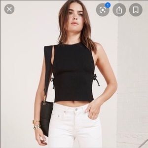 Reformation shirt with open air sides.